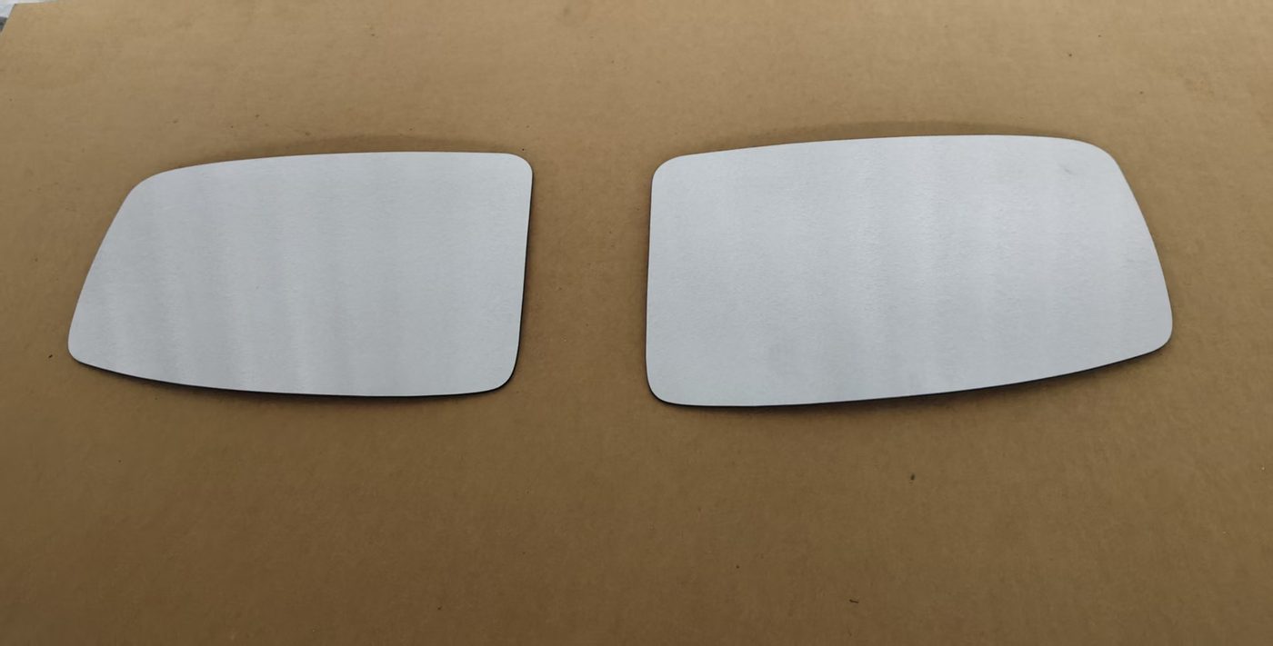 Cut-to-size mirror glass blank sheets ready for cutting lines